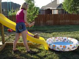 Danielle and Sierra on slide.JPG